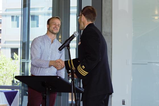 Fritz Siegert accepting the US Public Health Service Award