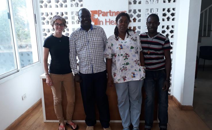 Photo of Katrin with her colleagues at Partners in Health in Liberia