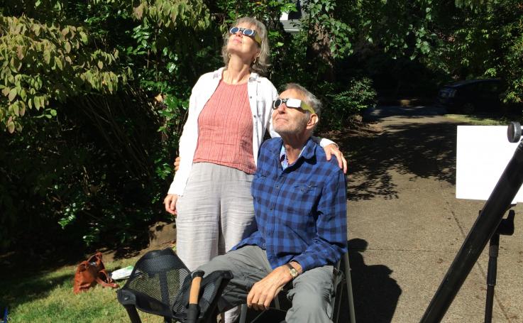 Mary Anne Mercer and Steve Bezruchka watch the eclipse