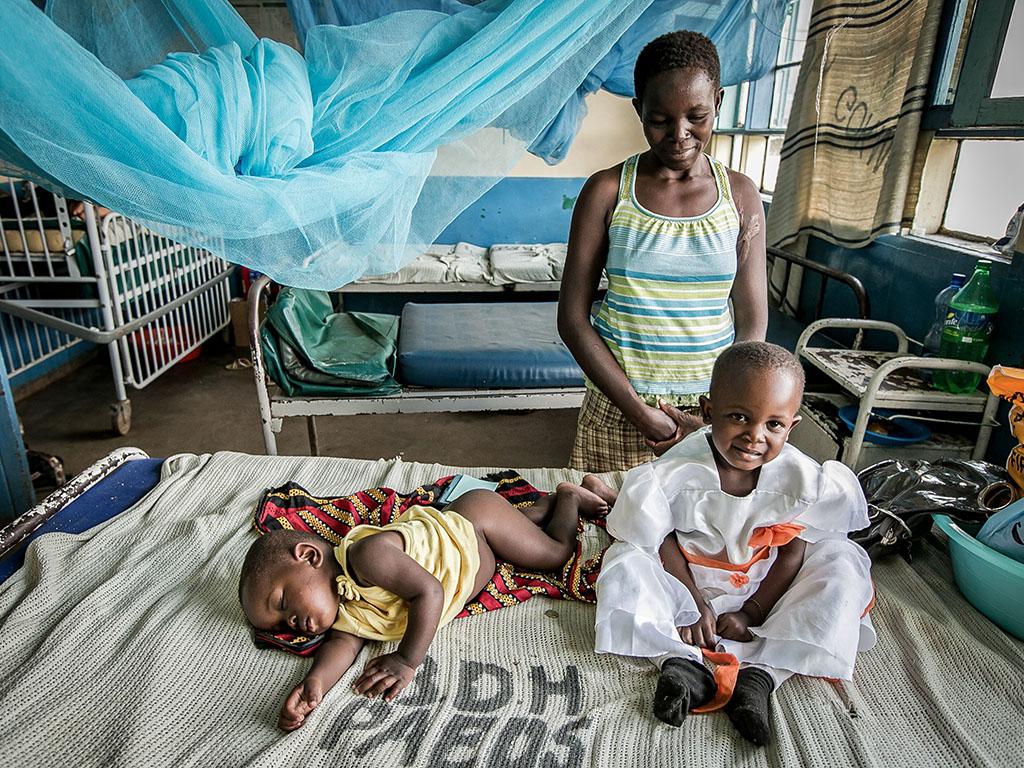 A mother with her two young children at a Global WACh research site in Bondo, Kenya A mother with her two young children at a Global WACh research site in Bondo, Kenya